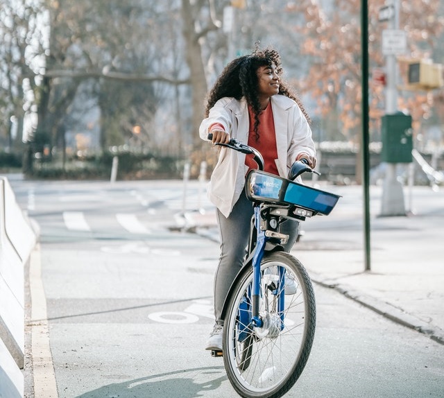 Girl enjoying biking in the city